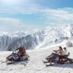 Snowboarding-and-snowmobile.jpg